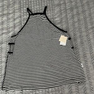 Kate Spade & Beyond Yoga come together to make this super soft & cute tanktop